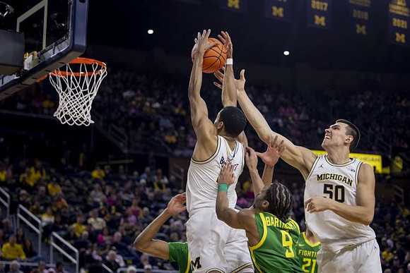 Nimari Burnett (4) and Vladislav Goldin (50)