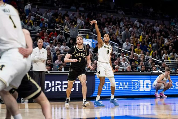 Danny Wolf (1), Purdue Head Coach Matt Painter, and Nimari Burnett (4)