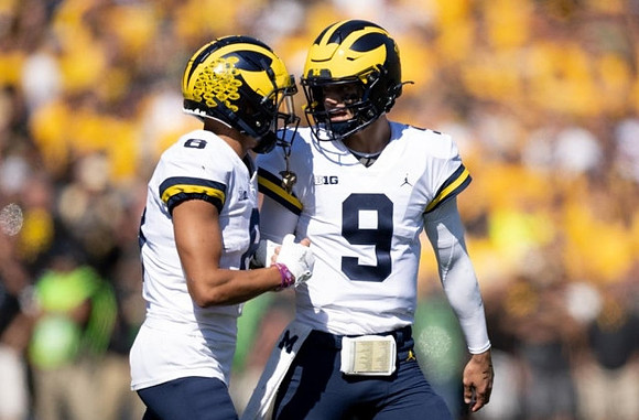 Ronnie Bell (8) and J.J. McCarthy (9)