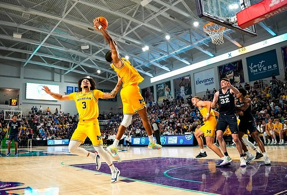Tre Donaldson (3), Nimari Burnett (4), and Will Tschetter (42)