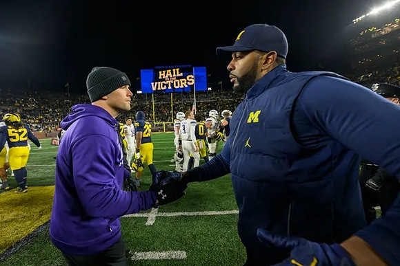 Northwestern Head Coach David Braun and Sherrone Moore