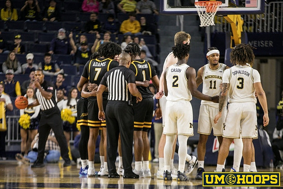 Danny Wolf (1), L.J. Cason (2), Roddy Gayle Jr. (11), and Tre Donaldson (3)