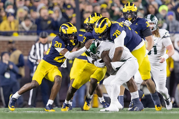 Jyaire Hill (20), Makari Paige (7), Kenneth Grant (78), and Jimmy Rolder (30)