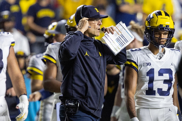 Jim Harbaugh and Tyler Morris (13)