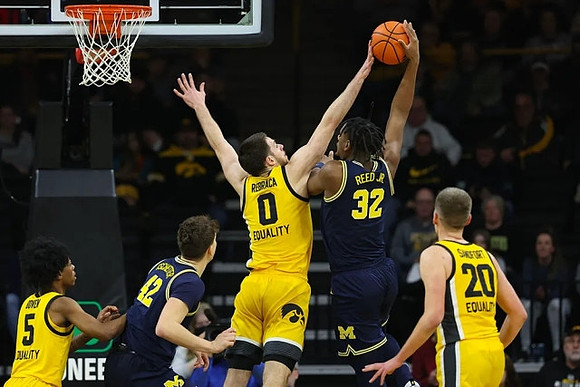 Will Tschetter (42) and Tarris Reed Jr. (32)