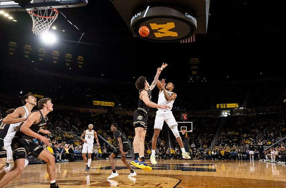 Vladislav Goldin (50), Nimari Burnett (4), and Roddy Gayle Jr. (11)