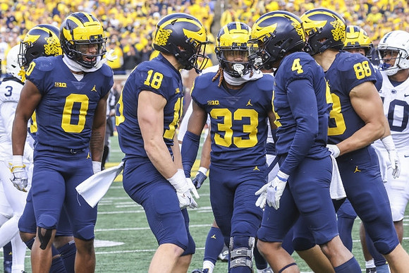 Darrius Clemons (0), Colston Loveland (18), German Green (33), Micah Pollard (4), and Matthew Hibner (88)
