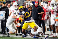 Jordan Marshall (23) and New Mexico Head Coach Jason Eck