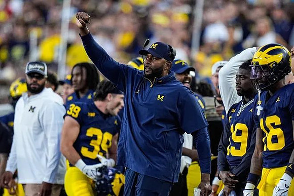 Sherrone Moore and Michigan Team