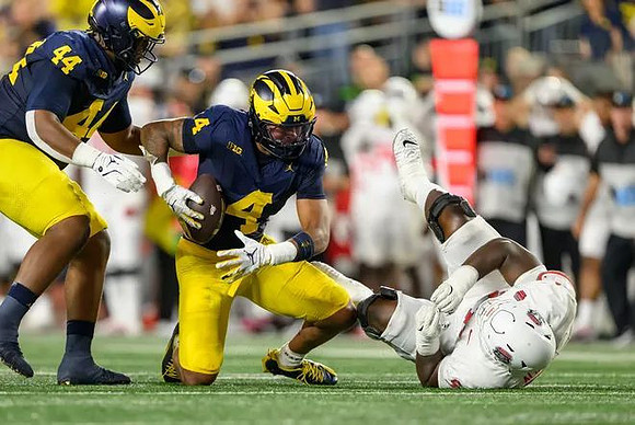 Damon Payne (44) and TJ Guy (4)