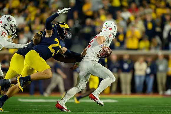 Trey Pierce (95) and Cole Sullivan (23)