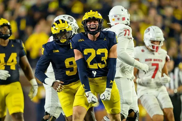 Damon Payne (44), Cameron Brandt (9), and Cole Sullivan (23)