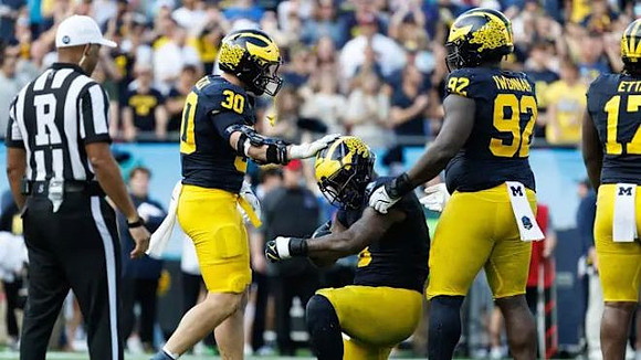 Jimmy Rolder (30), Ike Iwunnah (92), and Enow Etta (17)