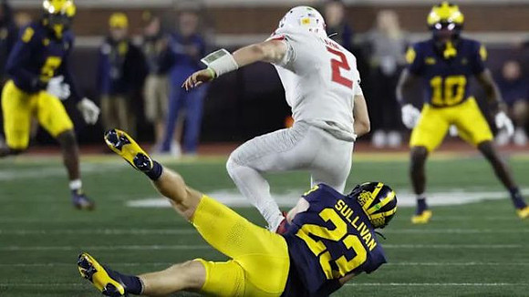 Cole Sullivan (23) and Zeke Berry (10)