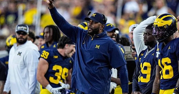 Sherrone Moore and Michigan Team