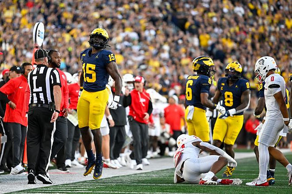 Ernest Hausmann (15), Brandyn Hillman (6), Derrick Moore (8), and Zeke Berry (10)