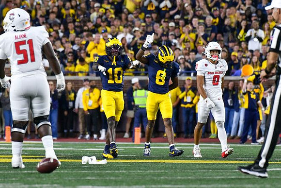 Zeke Berry (10) and Derrick Moore (8)