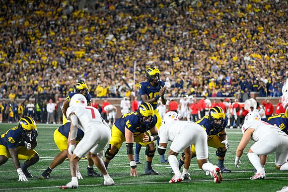 Jalen Hoffman (42), Bryce Underwood (19), Brady Norton (70), Andrew Sprague (54), and Greg Crippen (51)