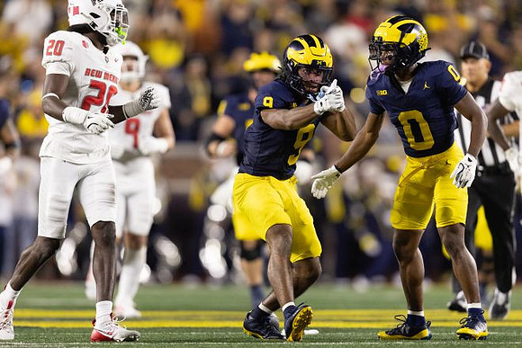 Channing Goodwin (9) and Semaj Morgan (0)