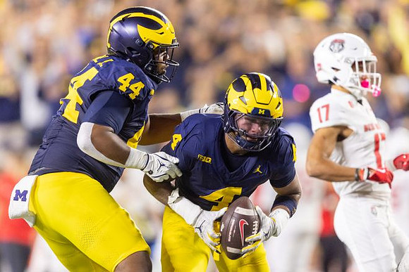 Damon Payne (44) and Andrew Marsh (4)
