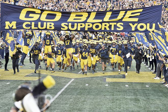 Sherrone Moore and Michigan Team