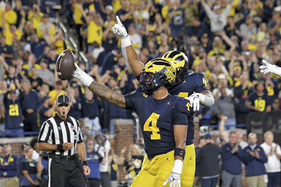 TJ Guy (4) and Damon Payne (44)