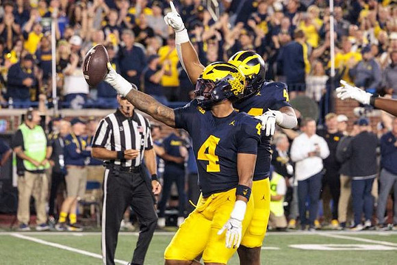TJ Guy (4) and Damon Payne (44)