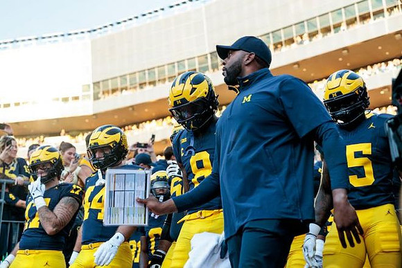Sherrone Moore and Michigan Team