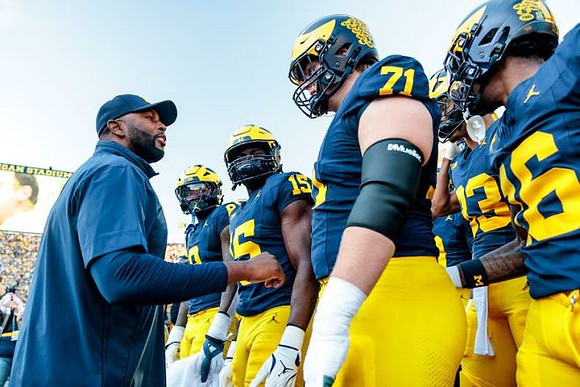 Sherrone Moore and Michigan Team