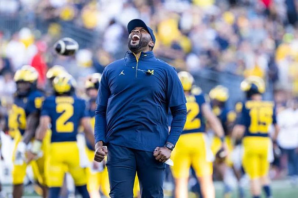 Sherrone Moore and Michigan Team