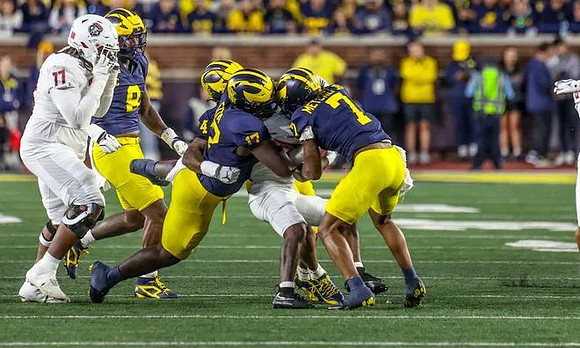 Derrick Moore (8), TJ Guy (4), Enow Etta (17), and TJ Metcalf (7)