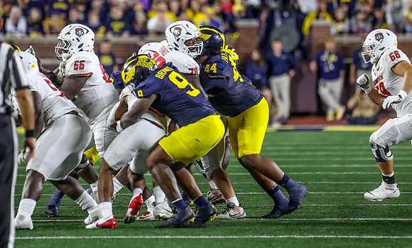 Cameron Brandt (9) and Damon Payne (44)
