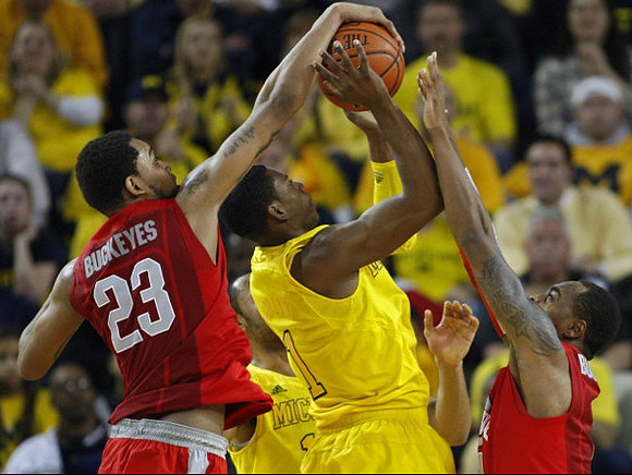 Glenn Robinson III (1) and Jon Horford (15)