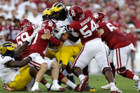 Derrick Moore (8) and Trey Pierce (95)