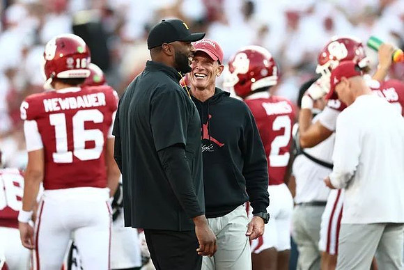 Sherrone Moore and Oklahoma Head Coach Brent Venables