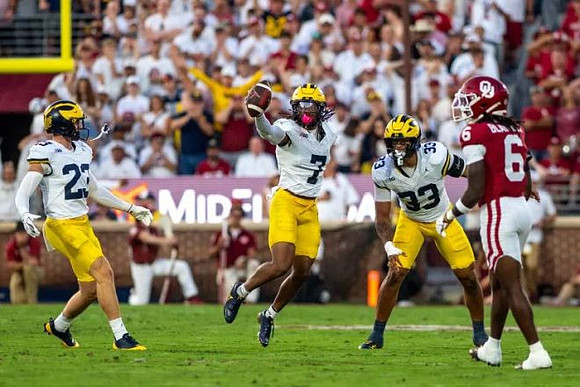 Cole Sullivan (23), TJ Metcalf (7), and Dominic Nichols (33)