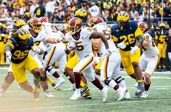 Trey Pierce (95) and Rayshaun Benny (26)