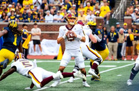 Jaishawn Barham (1) and Derrick Moore (8)