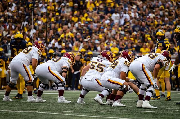 Cole Sullivan (23) and Tré Williams (0)