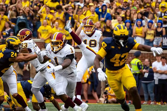 Bryson Kuzdzal (24) and Jalen Hoffman (42)