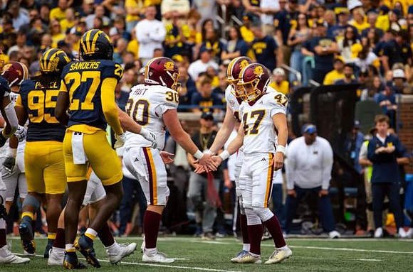 Trey Pierce (95) and Jayden Sanders (27)