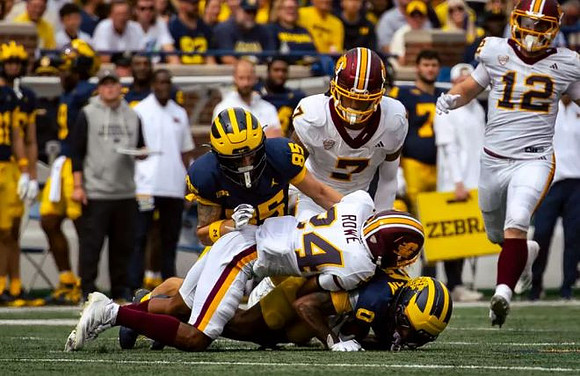 Logan Forbes (85) and Semaj Morgan (0)