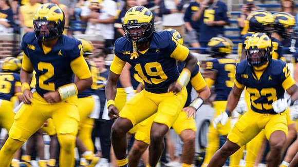 Jadyn Davis (2), Bryce Underwood (19), and Jordan Marshall (23)