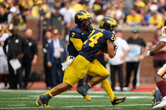 Jadyn Davis (2) and Bryson Kuzdzal (24)