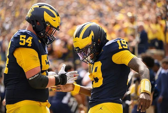 Andrew Sprague (54) and Bryce Underwood (19)