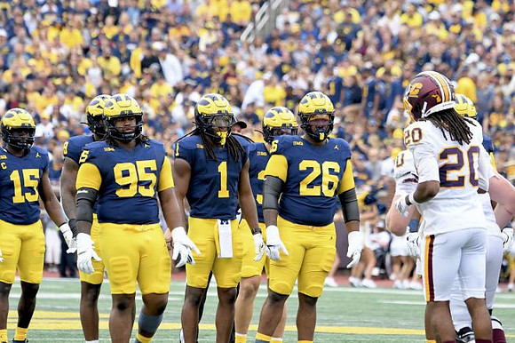Ernest Hausmann (15), Trey Pierce (95), Jaishawn Barham (1), and Rayshaun Benny (26)