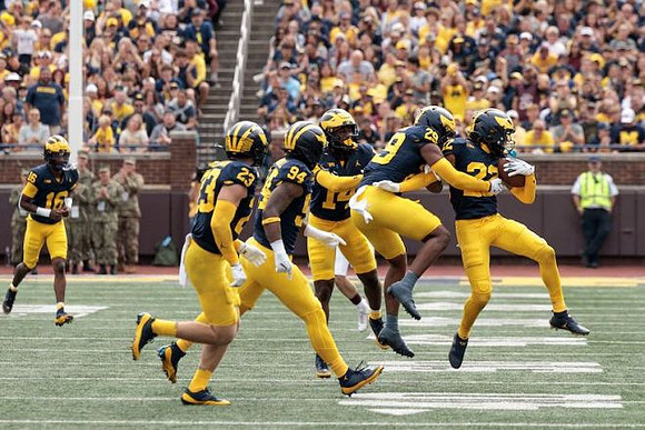 Jo'Ziah Edmond (16), Cole Sullivan (23), Nate Marshall (94), Jordan Young (14), Kainoa Winston (28), and Elijah Dotson (22)