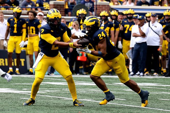 Jadyn Davis (2) and Bryson Kuzdzal (24)