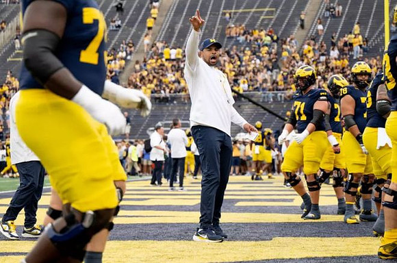 Grant Newsome and Michigan Team