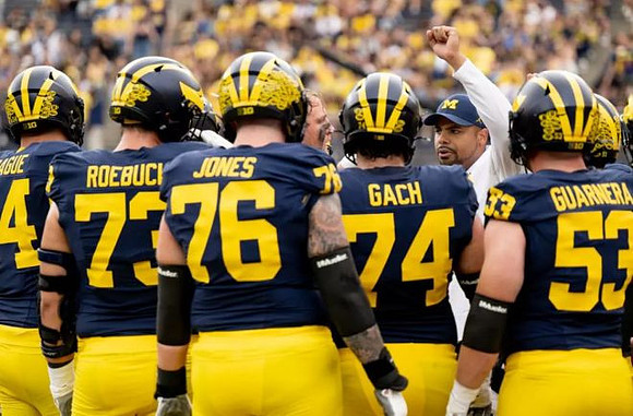 Grant Newsome and Michigan Team
